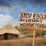 A sign warning about Ebola outbreak in Africa